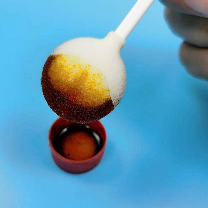 Esponja de limpieza de heridas de alta capacidad de fluido: Mango de 105 mm con cabeza redonda grande para una gestión eficiente del exudado